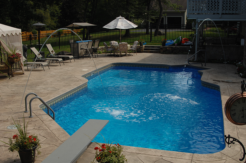 Swimming pool and stamped concrete project example 116